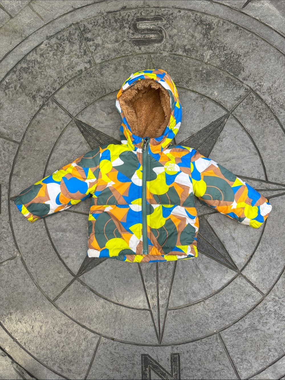 The North Face Kids Bright Multi-Color Puffer Jacket with Faux-Fur Hood